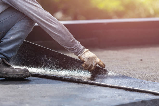 Professional Waterproofing technician working in Castalian Springs, TN